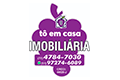 Logo Tô em Casa Imóveis - Evelize Paula